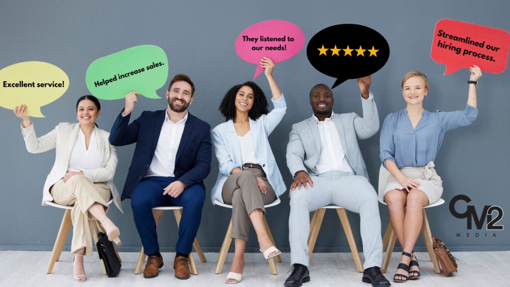 People holding up positive comments - why are client testimonials important - CM2 Media.