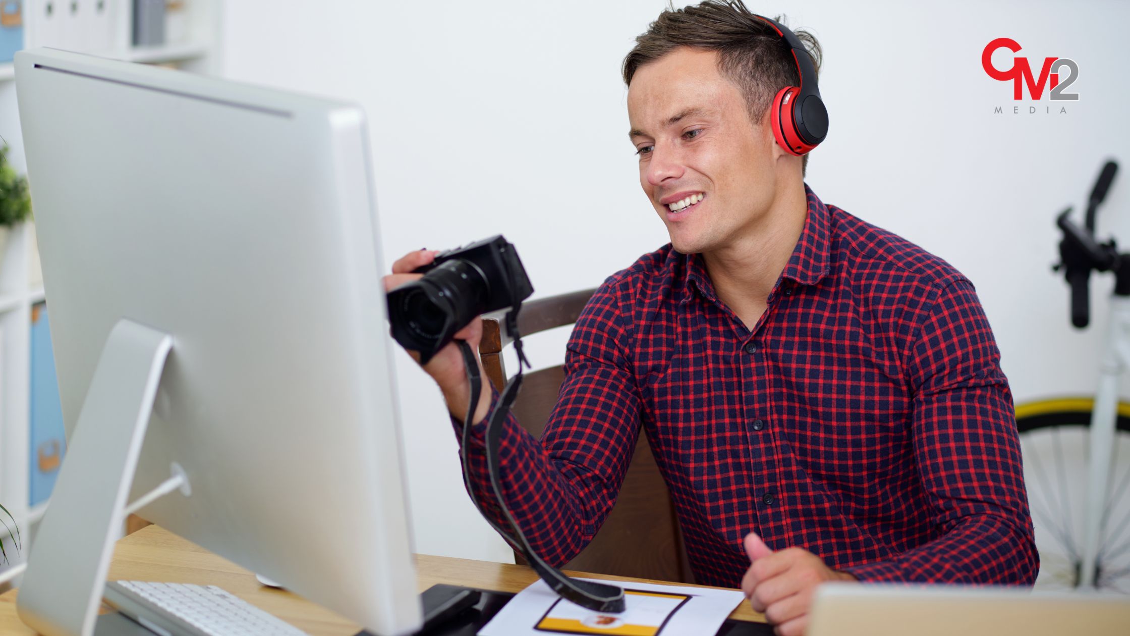 Boost your online identify - man using a phone and computer - how ai is changing SEO insights from CM2 Media.
