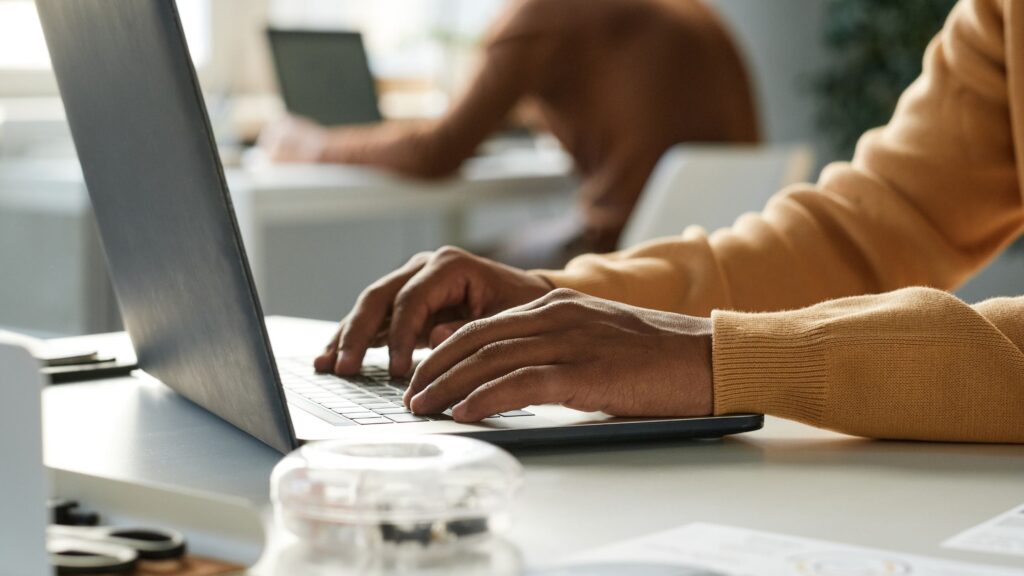 Local SEO Checklist - faceless person typing - CM2 Media.